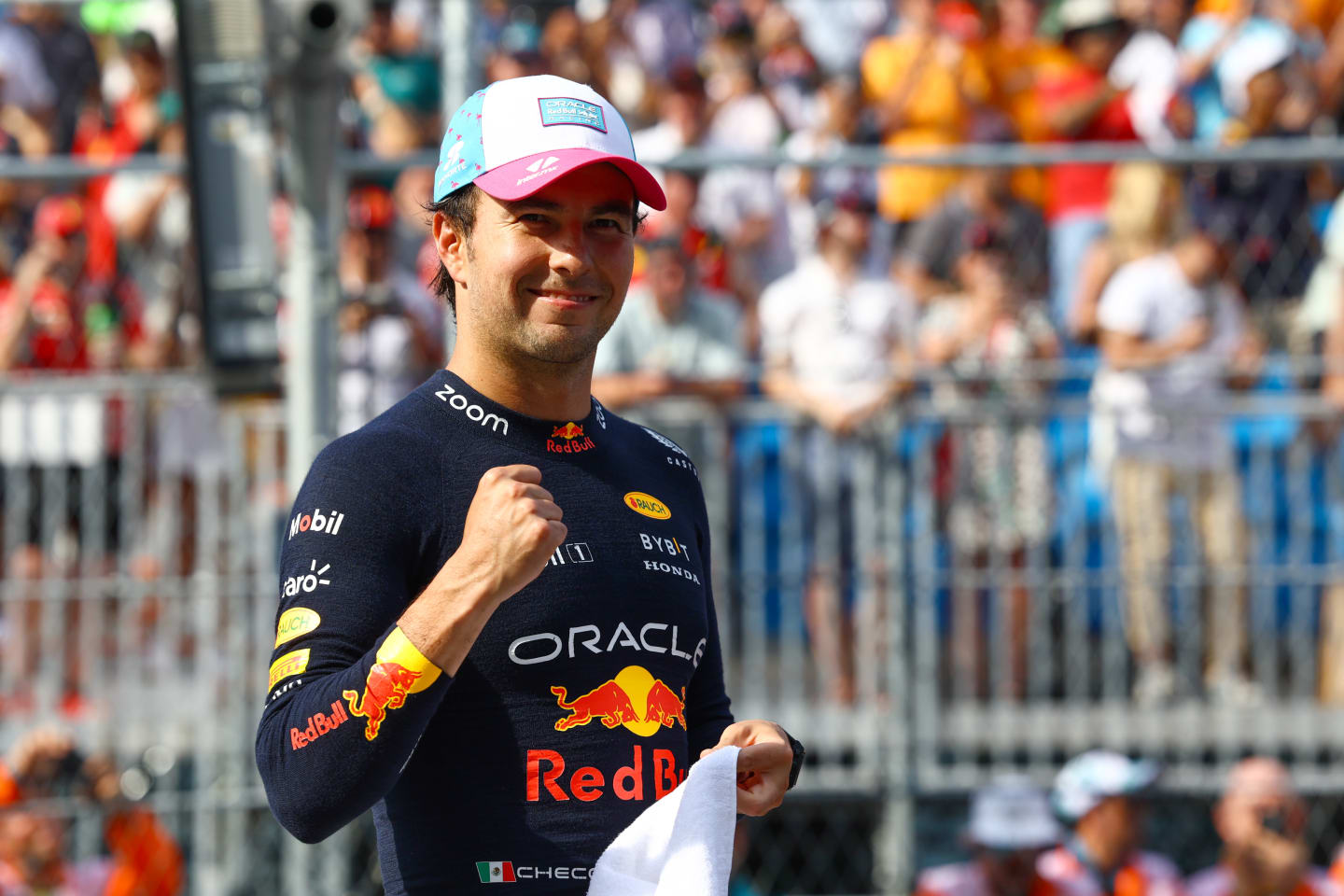 MIAMI, FLORIDA - MAY 06: Pole position qualifier Sergio Perez of Mexico and Oracle Red Bull Racing celebrates in parc ferme during qualifying ahead of the F1 Grand Prix of Miami at Miami International Autodrome on May 06, 2023 in Miami, Florida. (Photo by Mark Thompson/Getty Images)