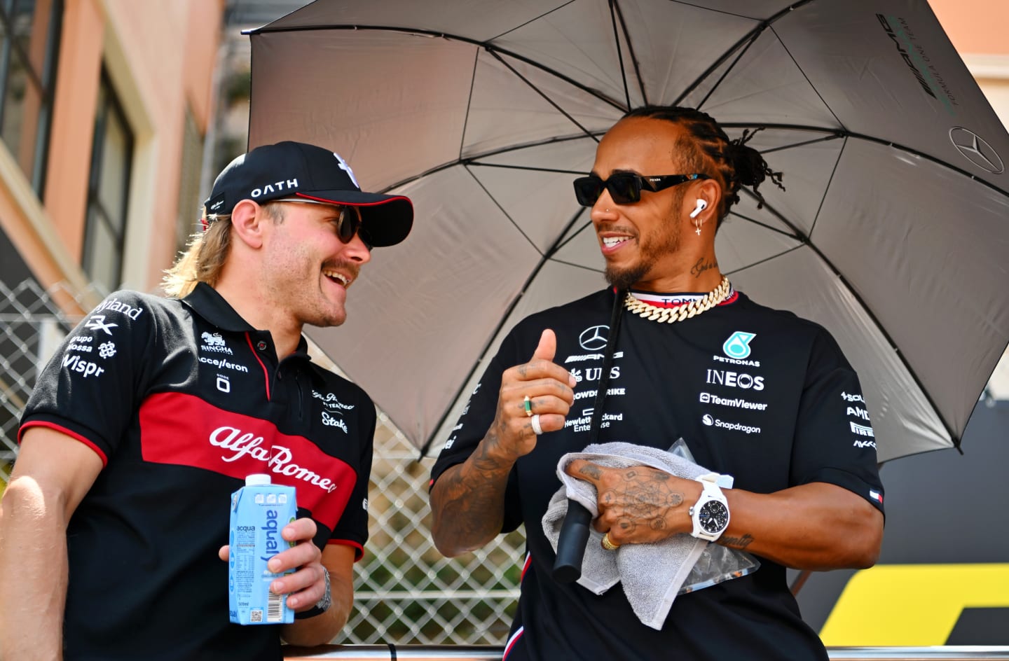 MONTE-CARLO, MONACO - MAY 28: Lewis Hamilton of Great Britain and Mercedes talks with Valtteri Bottas of Finland and Alfa Romeo F1 on the drivers parade prior to the F1 Grand Prix of Monaco at Circuit de Monaco on May 28, 2023 in Monte-Carlo, Monaco. (Photo by Dan Mullan/Getty Images)