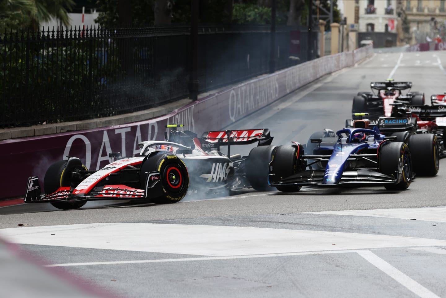 MONTE-CARLO, MONACO - MAY 28: Nico Hulkenberg of Germany driving the (27) Haas F1 VF-23 Ferrari collides with Logan Sargeant of United States driving the (2) Williams FW45 Mercedes during the F1 Grand Prix of Monaco at Circuit de Monaco on May 28, 2023 in Monte-Carlo, Monaco. (Photo by Ryan Pierse/Getty Images)