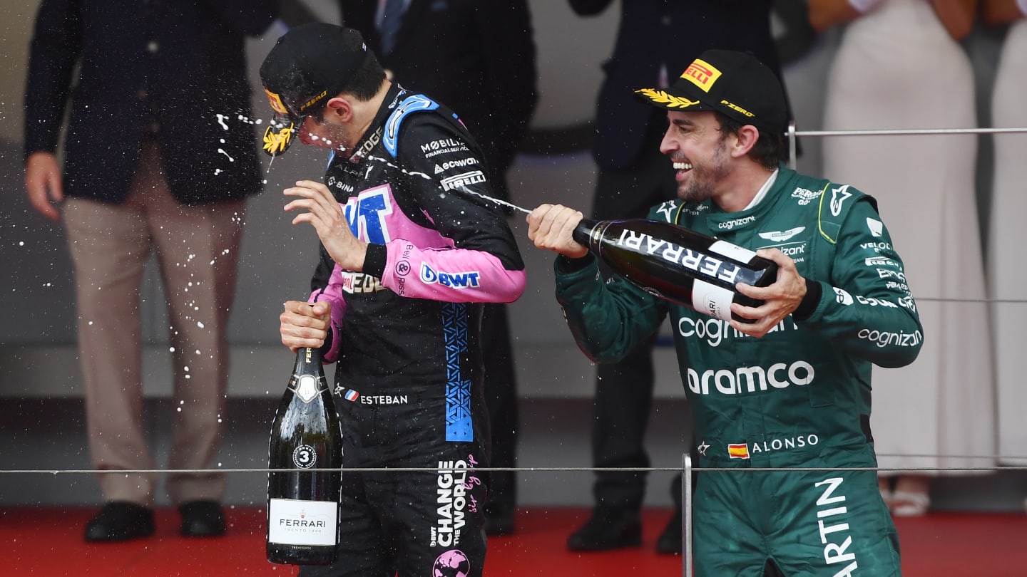 MONTE-CARLO, MONACO - MAY 28: Second placed Fernando Alonso of Spain and Aston Martin F1 Team and Third placed Esteban Ocon of France and Alpine F1 celebrate on the podium during the F1 Grand Prix of Monaco at Circuit de Monaco on May 28, 2023 in Monte-Carlo, Monaco. (Photo by Rudy Carezzevoli - Formula 1/Formula 1 via Getty Images)