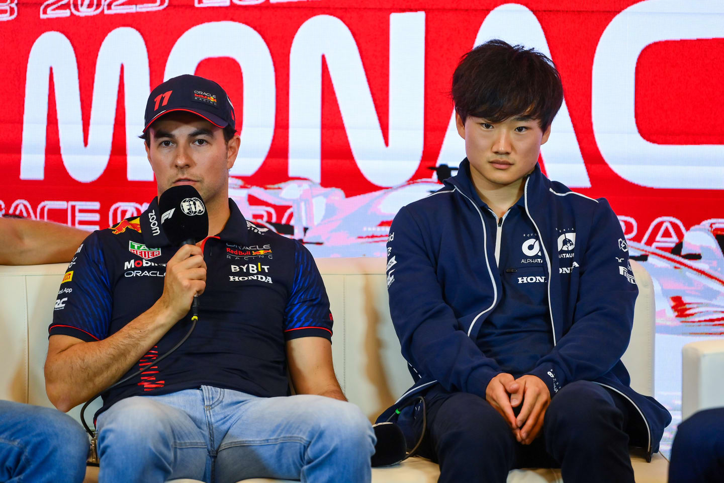 MONTE-CARLO, MONACO - MAY 25: Sergio Perez of Mexico and Oracle Red Bull Racing and Yuki Tsunoda of