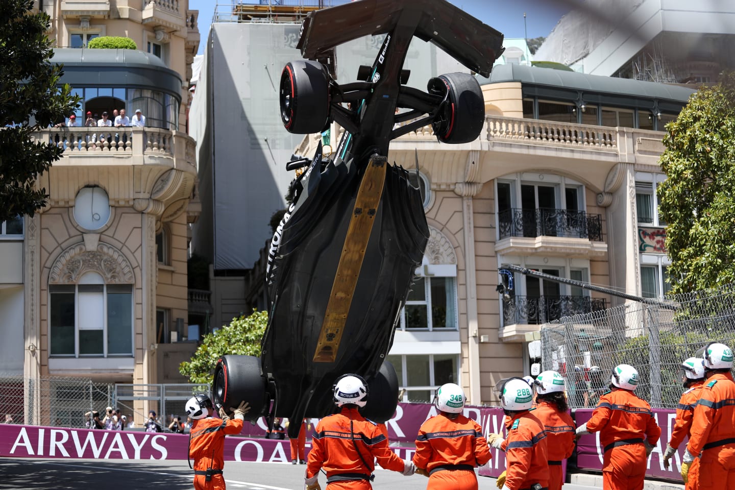 MONTE-CARLO, MONACO - MAY 27: The car of Lewis Hamilton of Great Britain and Mercedes is lifted on