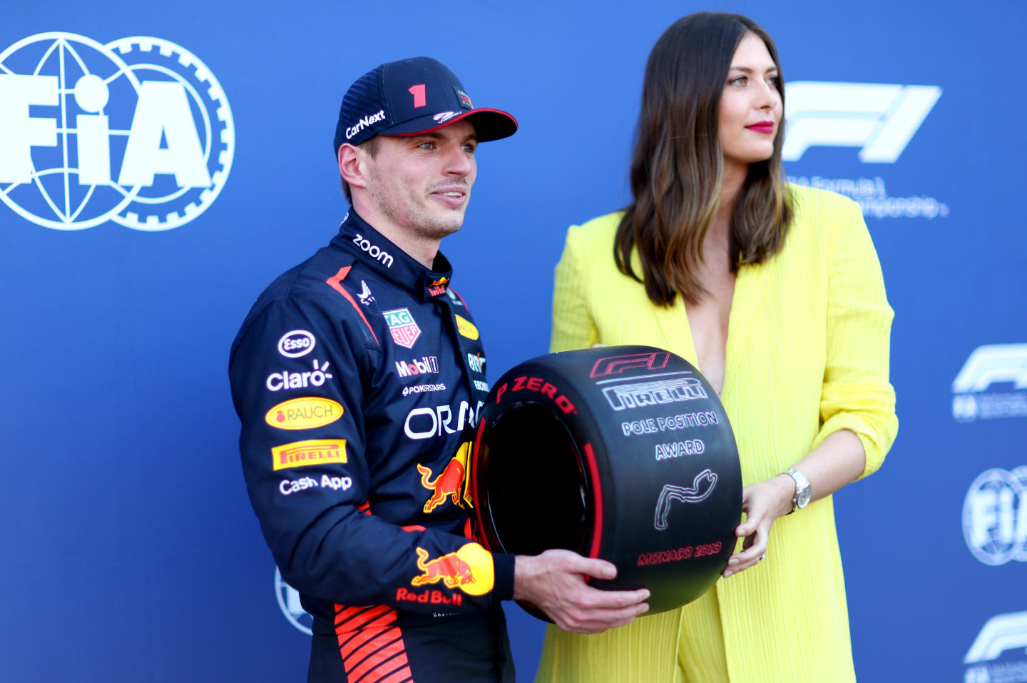 MONTE-CARLO, MONACO - MAY 27: Pole position qualifier Max Verstappen of the Netherlands and Oracle Red Bull Racing is presented with the Pirelli Pole Position Award by Maria Sharapova during qualifying ahead of the F1 Grand Prix of Monaco at Circuit de Monaco on May 27, 2023 in Monte-Carlo, Monaco. (Photo by Dan Istitene - Formula 1/Formula 1 via Getty Images)
