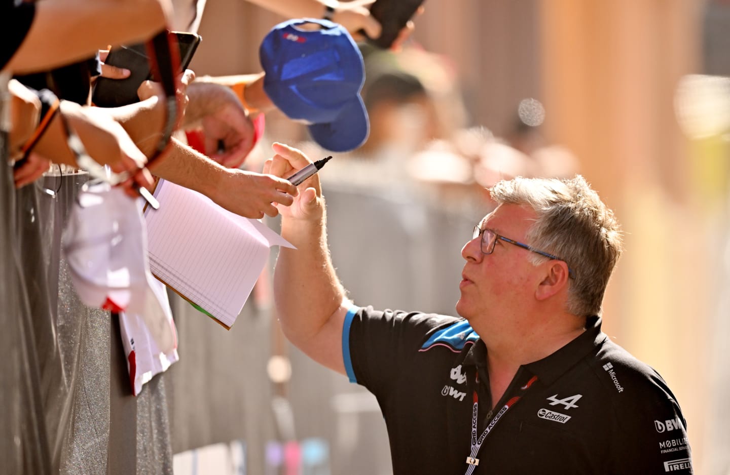 MONTE-CARLO, MONACO - MAY 27: Otmar Szafnauer, Team Principal of Alpine F1 signs autographs for