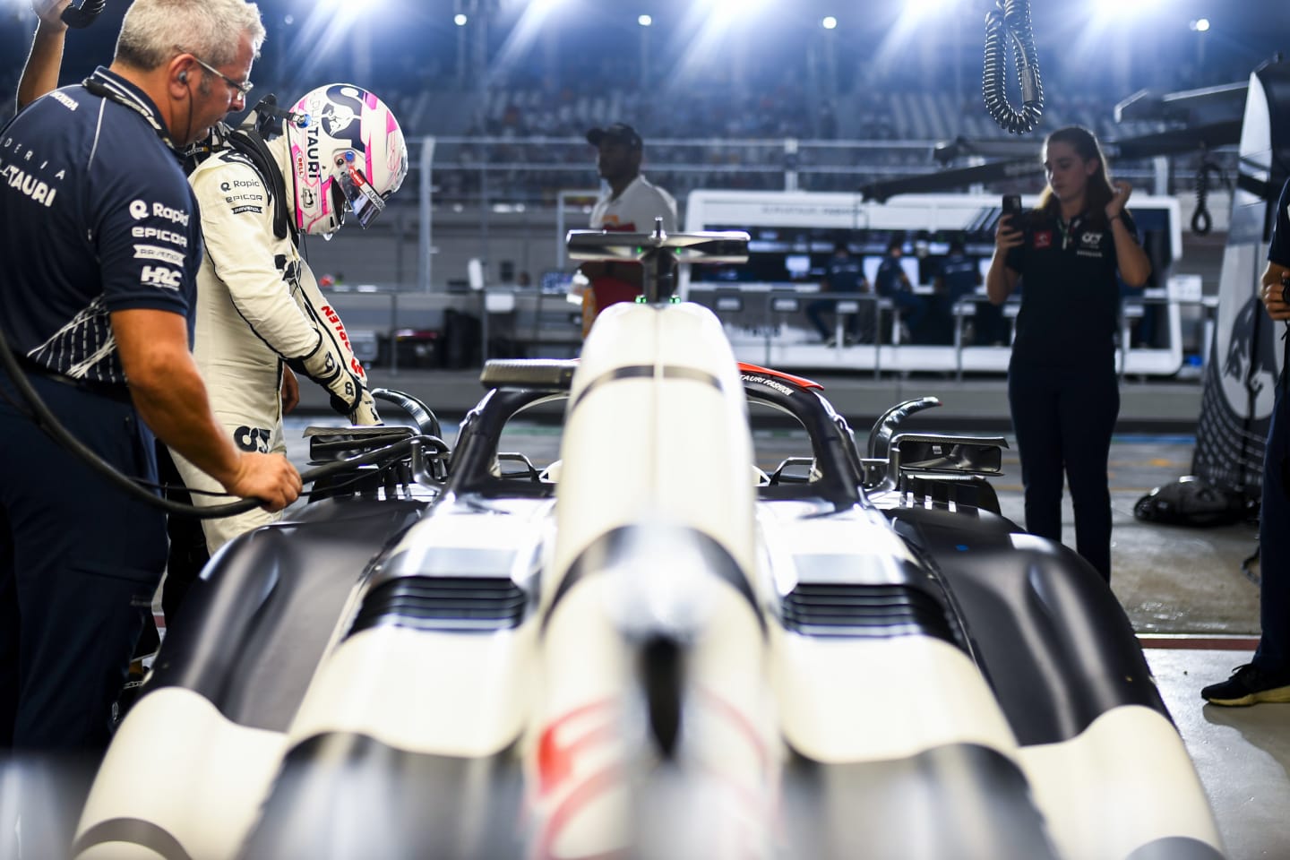 LUSAIL CITY, QATAR - OCTOBER 08: Liam Lawson of New Zealand and Scuderia AlphaTauri prepares to drive in the garage prior to the F1 Grand Prix of Qatar at Lusail International Circuit on October 08, 2023 in Lusail City, Qatar. (Photo by Rudy Carezzevoli/Getty Images)
