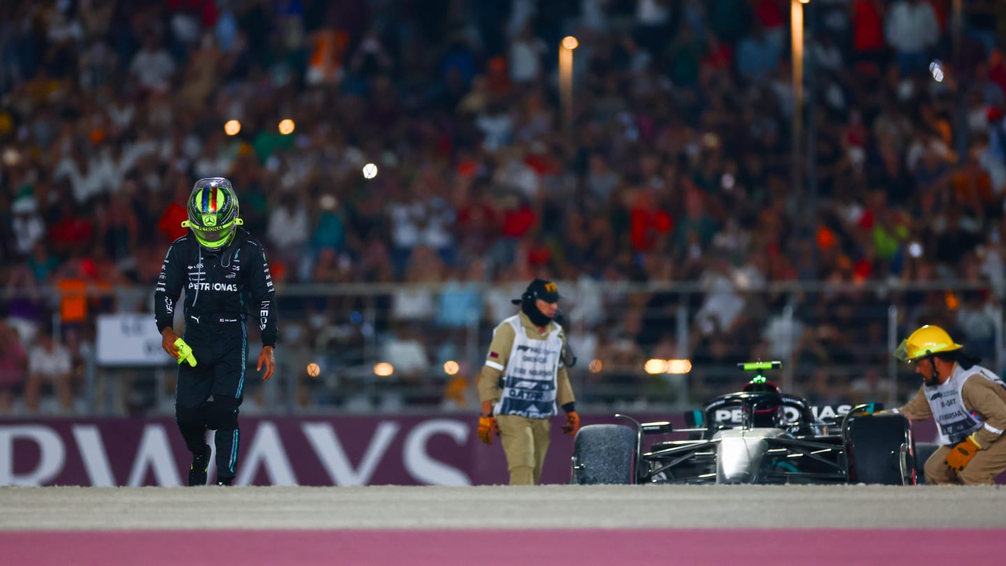 LUSAIL CITY, QATAR - OCTOBER 08: Lewis Hamilton of Great Britain and Mercedes looks on after