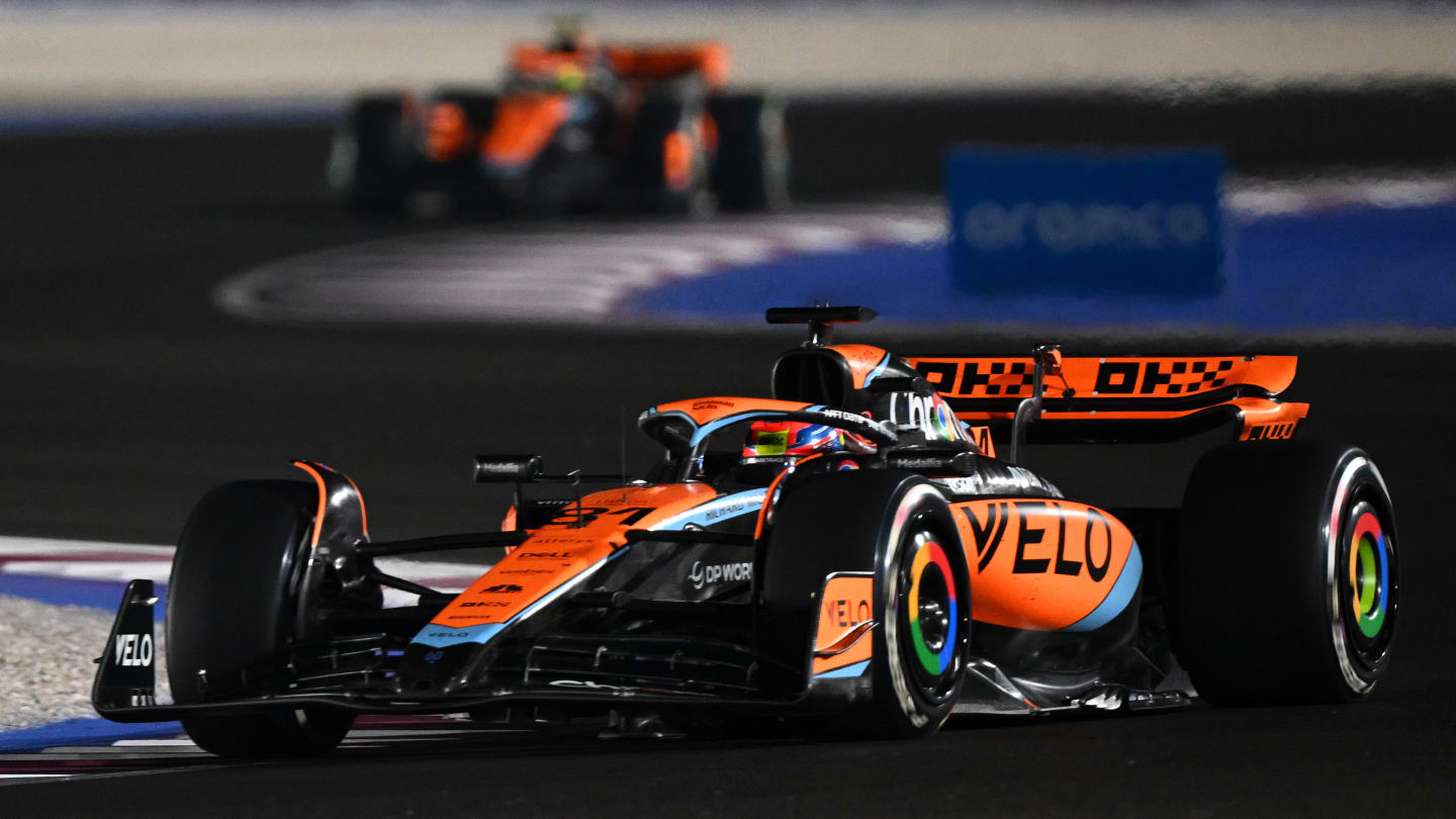 LUSAIL CITY, QATAR - OCTOBER 08: Oscar Piastri of Australia driving the (81) McLaren MCL60 Mercedes leads Lando Norris of Great Britain driving the (4) McLaren MCL60 Mercedes during the F1 Grand Prix of Qatar at Lusail International Circuit on October 08, 2023 in Lusail City, Qatar. (Photo by Clive Mason - Formula 1/Formula 1 via Getty Images)