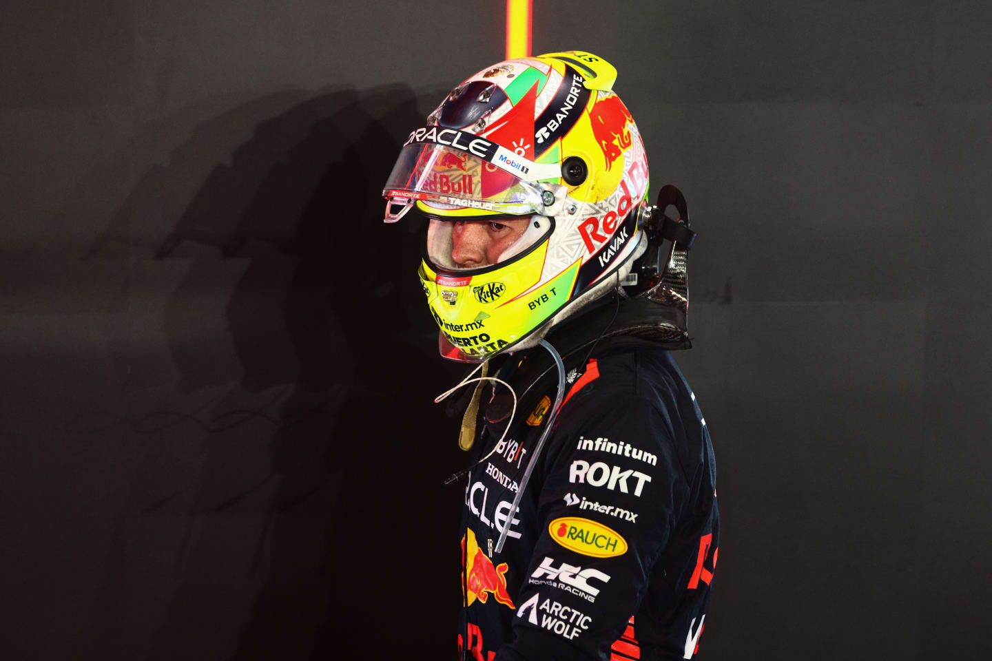 LUSAIL CITY, QATAR - OCTOBER 08: 10th placed Sergio Perez of Mexico and Oracle Red Bull Racing walks in parc ferme during the F1 Grand Prix of Qatar at Lusail International Circuit on October 08, 2023 in Lusail City, Qatar. (Photo by Clive Rose/Getty Images)
