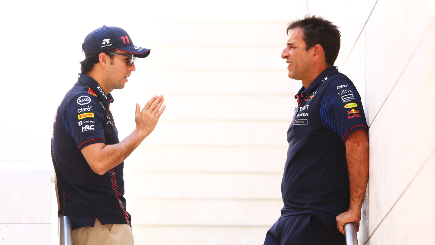 LUSAIL CITY, QATAR - OCTOBER 06: Sergio Perez of Mexico and Oracle Red Bull Racing talks with
