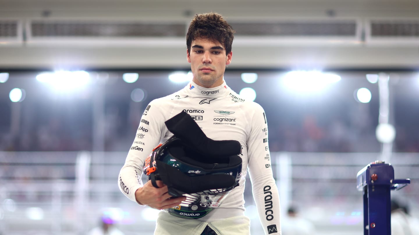 LUSAIL CITY, QATAR - OCTOBER 06: 17th placed qualifier Lance Stroll of Canada and Aston Martin F1 Team looks on in the FIA garage during qualifying ahead of the F1 Grand Prix of Qatar at Lusail International Circuit on October 06, 2023 in Lusail City, Qatar. (Photo by Dan Istitene - Formula 1/Formula 1 via Getty Images)