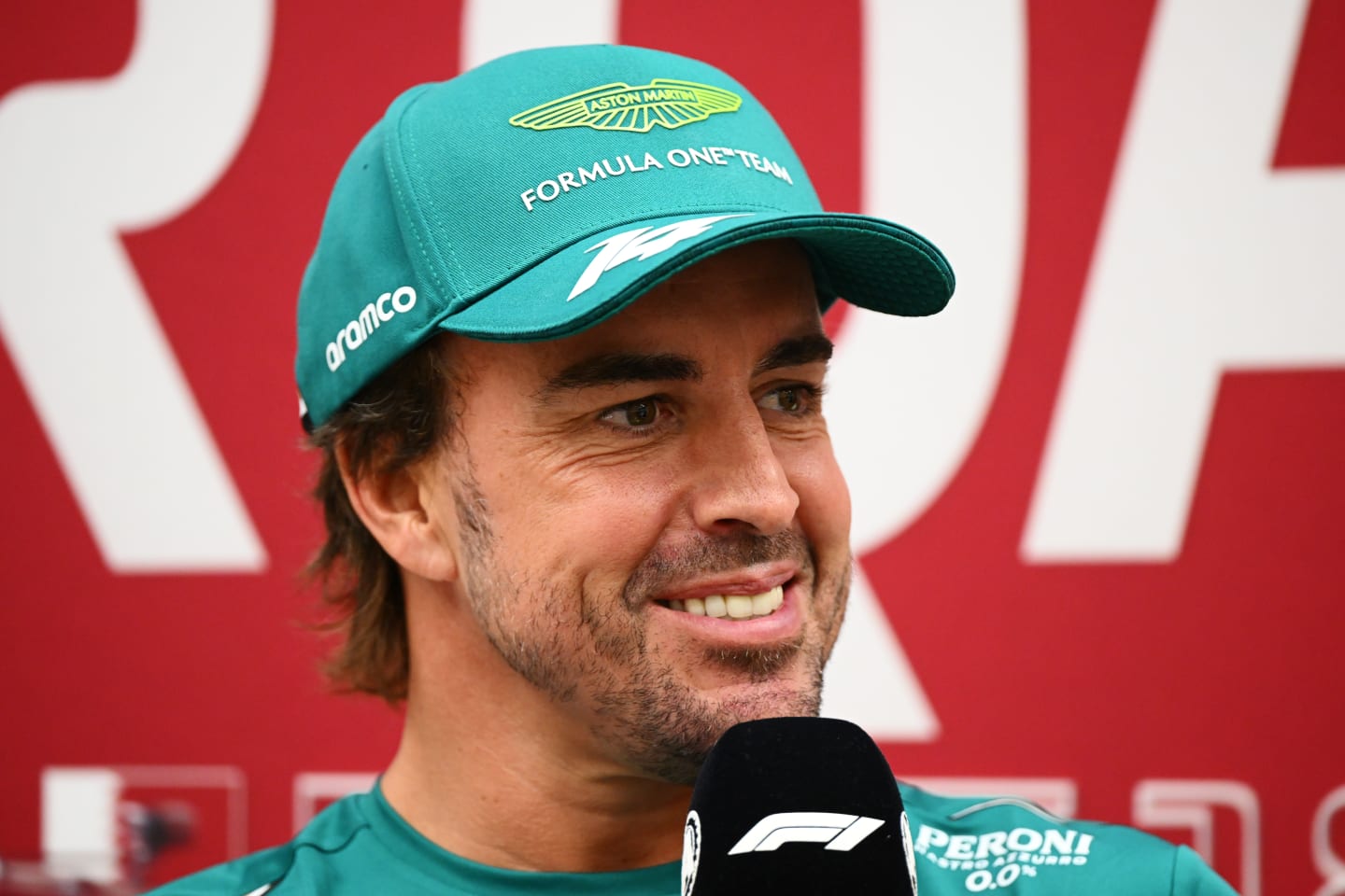 LUSAIL CITY, QATAR - OCTOBER 05: Fernando Alonso of Spain and Aston Martin F1 Team attends the Drivers Press Conference during previews ahead of the F1 Grand Prix of Qatar at Lusail International Circuit on October 05, 2023 in Lusail City, Qatar. (Photo by Clive Mason/Getty Images)