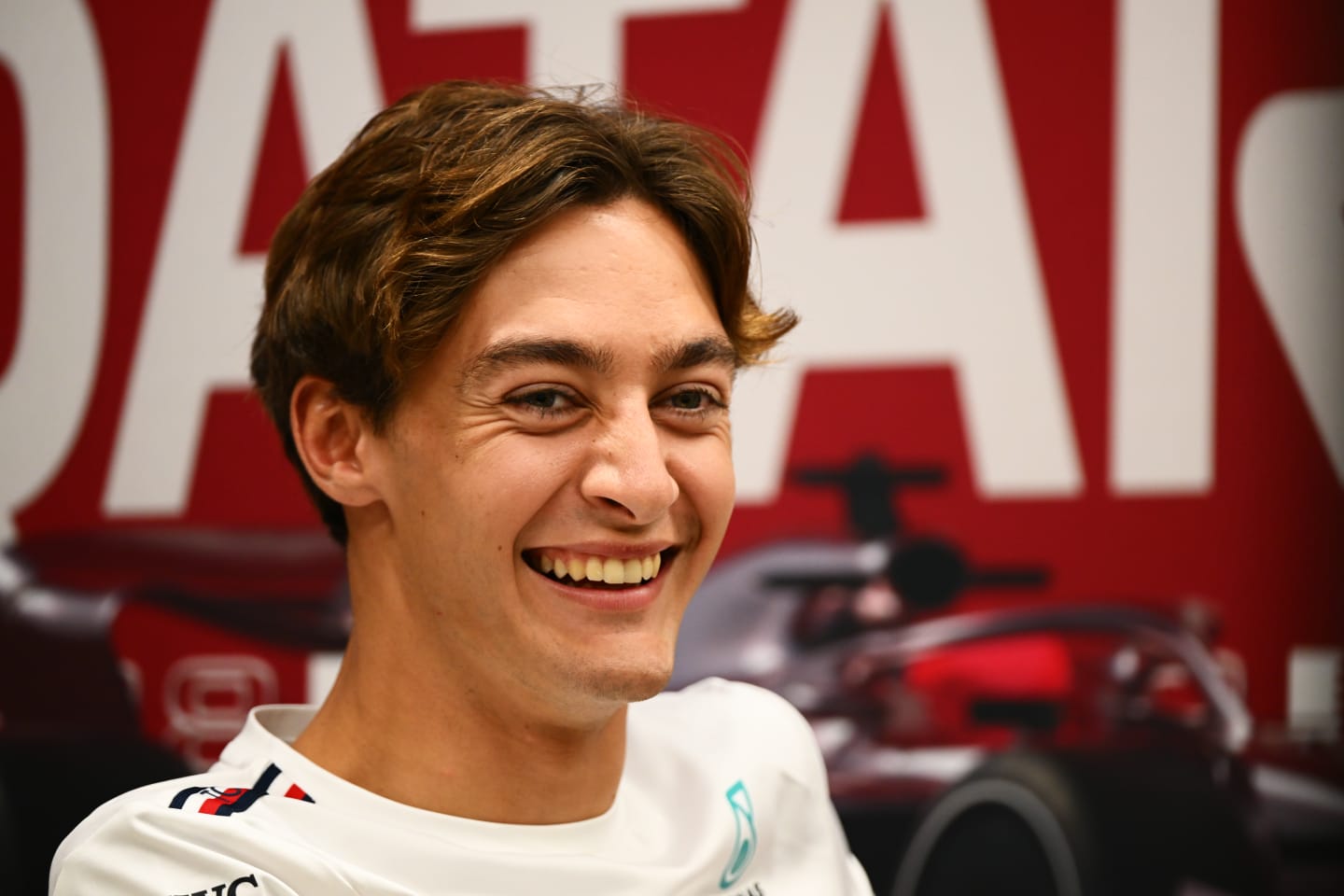 LUSAIL CITY, QATAR - OCTOBER 05: George Russell of Great Britain and Mercedes attends the Drivers Press Conference during previews ahead of the F1 Grand Prix of Qatar at Lusail International Circuit on October 05, 2023 in Lusail City, Qatar. (Photo by Clive Mason/Getty Images)