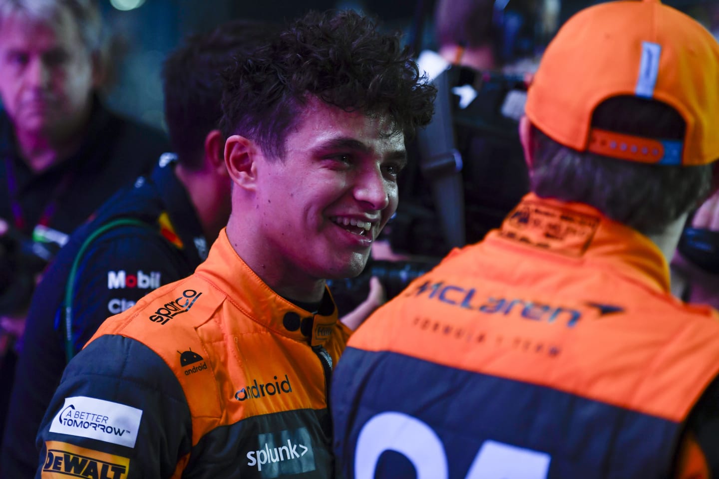 LUSAIL CITY, QATAR - OCTOBER 07: Third placed Lando Norris of Great Britain driving the (4) McLaren MCL60 Mercedes talks with sprint winner Oscar Piastri of Australia and McLaren in parc ferme after the Sprint ahead of the F1 Grand Prix of Qatar at Lusail International Circuit on October 07, 2023 in Lusail City, Qatar. (Photo by Rudy Carezzevoli/Getty Images)
