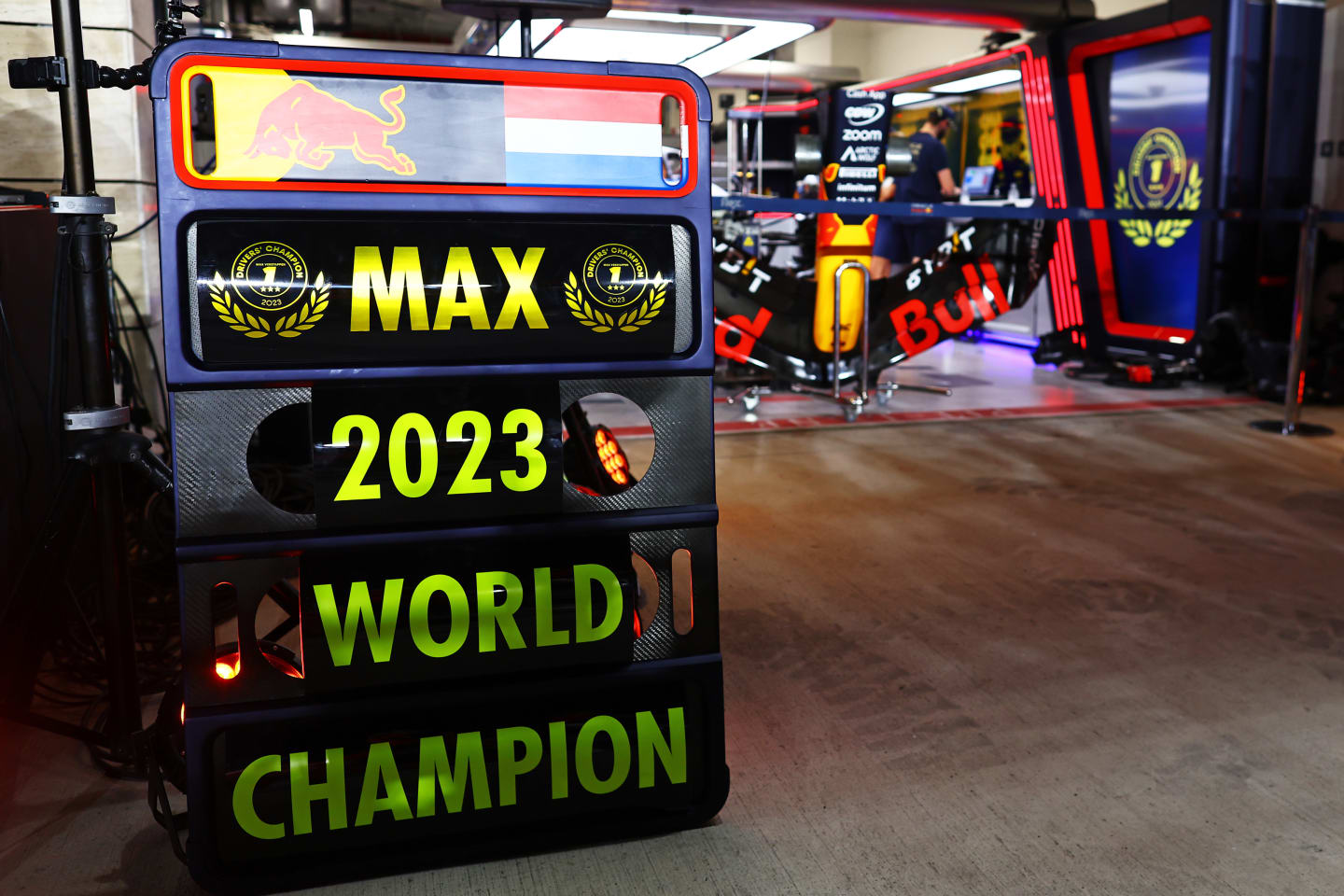 LUSAIL CITY, QATAR - OCTOBER 07: A pit board celebrating the 2023 F1 World Drivers Championship victory of Max Verstappen of the Netherlands and Oracle Red Bull Racing in the Pitlane after the Sprint ahead of the F1 Grand Prix of Qatar at Lusail International Circuit on October 07, 2023 in Lusail City, Qatar. (Photo by Mark Thompson/Getty Images)