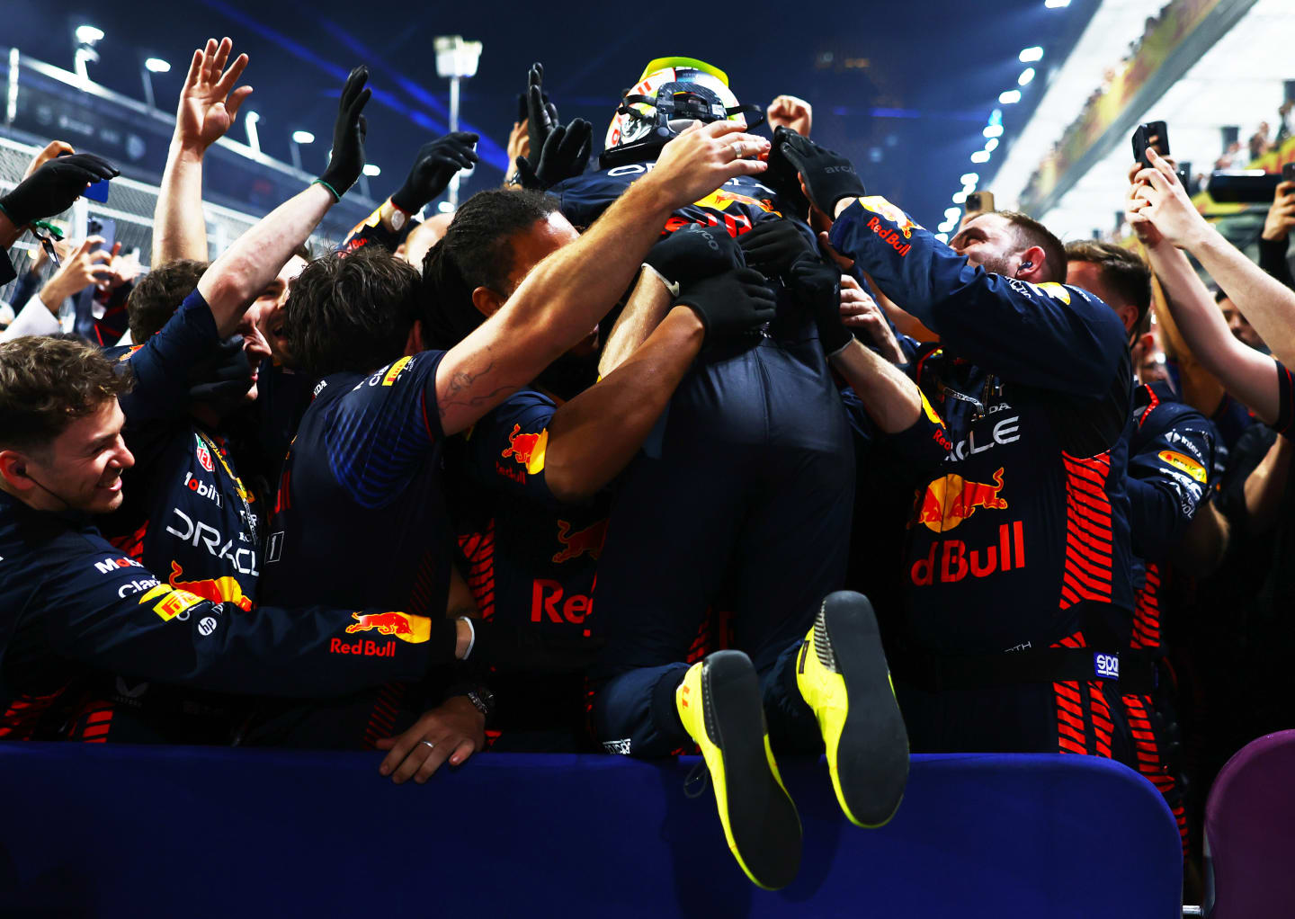 JEDDAH, SAUDI ARABIA - MARCH 19: Race winner Sergio Perez of Mexico and Oracle Red Bull Racing celebrates in parc ferme during the F1 Grand Prix of Saudi Arabia at Jeddah Corniche Circuit on March 19, 2023 in Jeddah, Saudi Arabia. (Photo by Mark Thompson/Getty Images)
