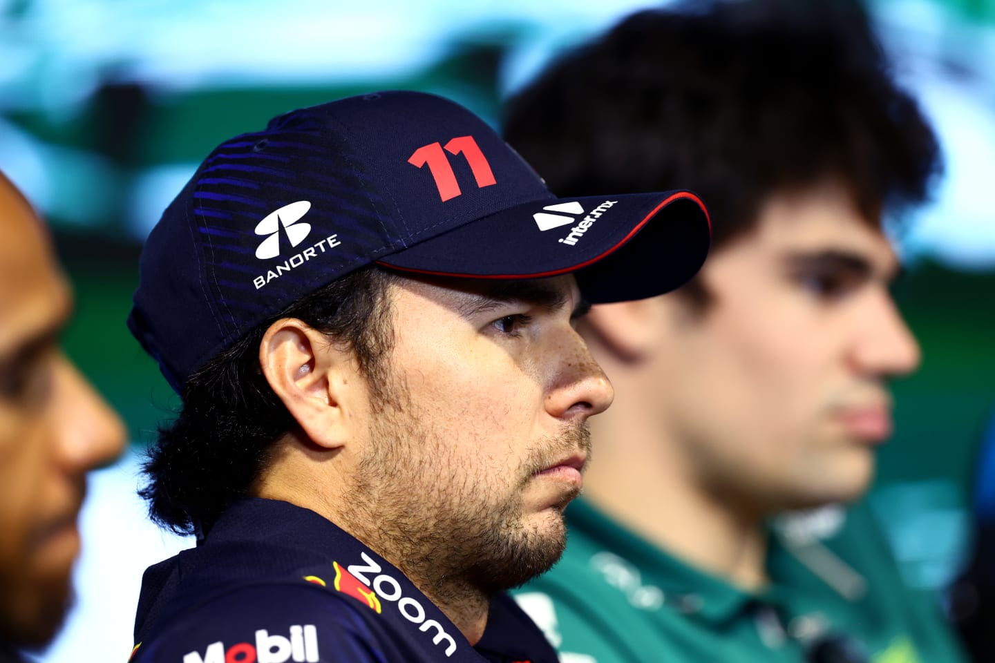 JEDDAH, SAUDI ARABIA - MARCH 16: Sergio Perez of Mexico and Oracle Red Bull Racing looks on in the Drivers Press Conference during previews ahead of the F1 Grand Prix of Saudi Arabia at Jeddah Corniche Circuit on March 16, 2023 in Jeddah, Saudi Arabia. (Photo by Bryn Lennon/Getty Images)