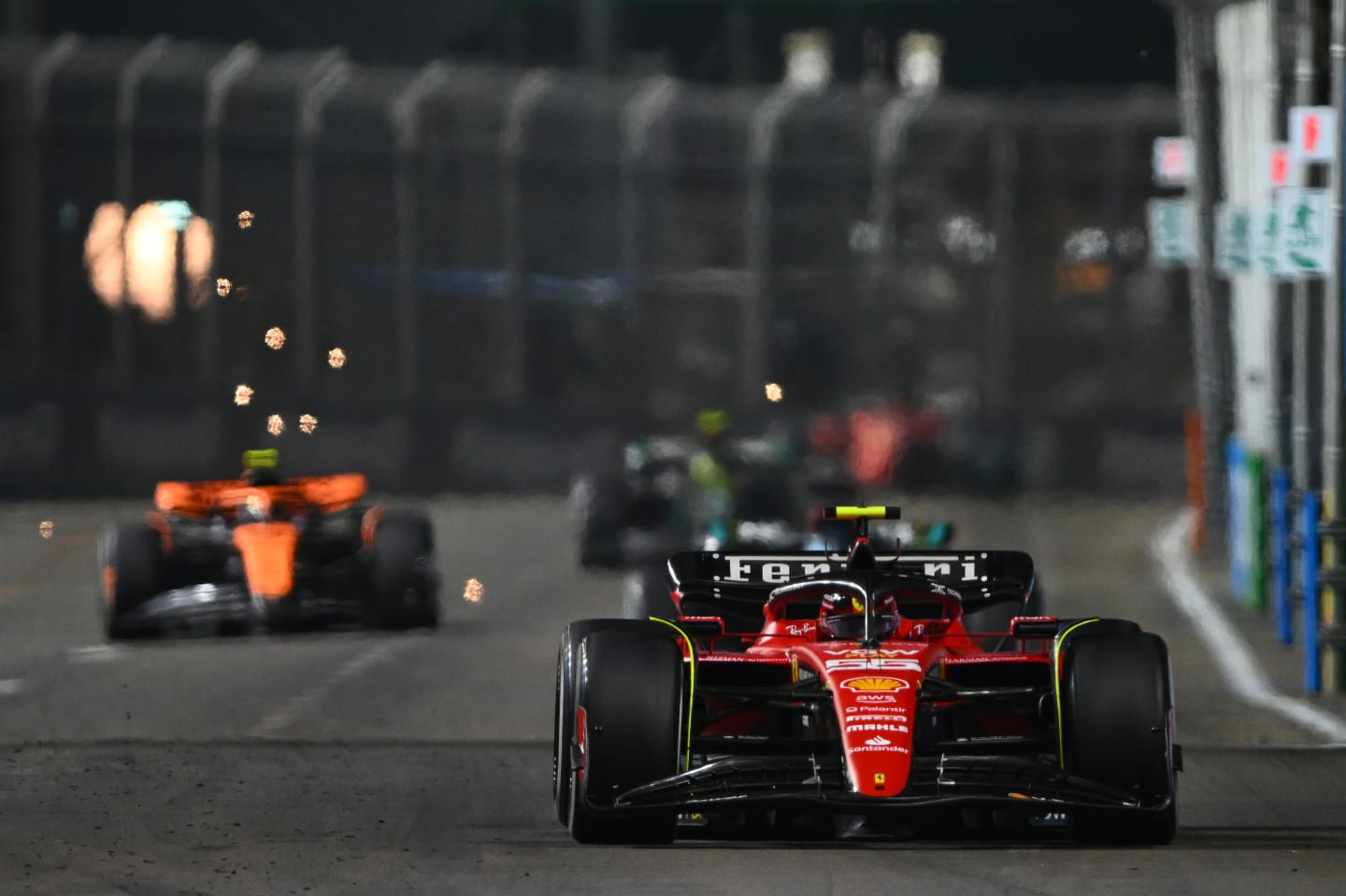 SINGAPORE, SINGAPORE - SEPTEMBER 17: Carlos Sainz of Spain driving (55) the Ferrari SF-23 on track