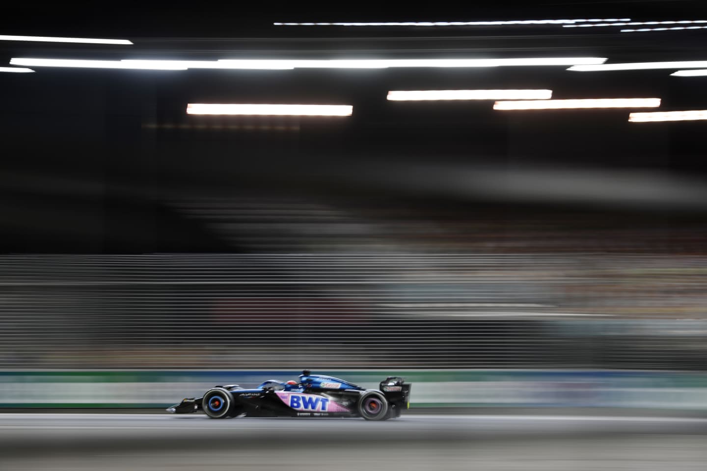 SINGAPORE, SINGAPORE - SEPTEMBER 17: Esteban Ocon of France driving the (31) Alpine F1 A523 Renault