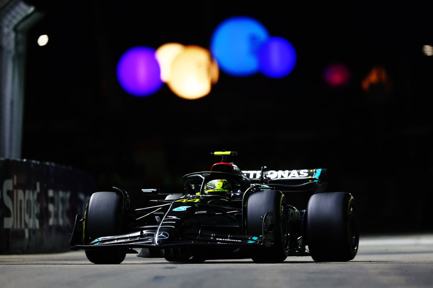 SINGAPORE, SINGAPORE - SEPTEMBER 17: Lewis Hamilton of Great Britain driving the (44) Mercedes AMG