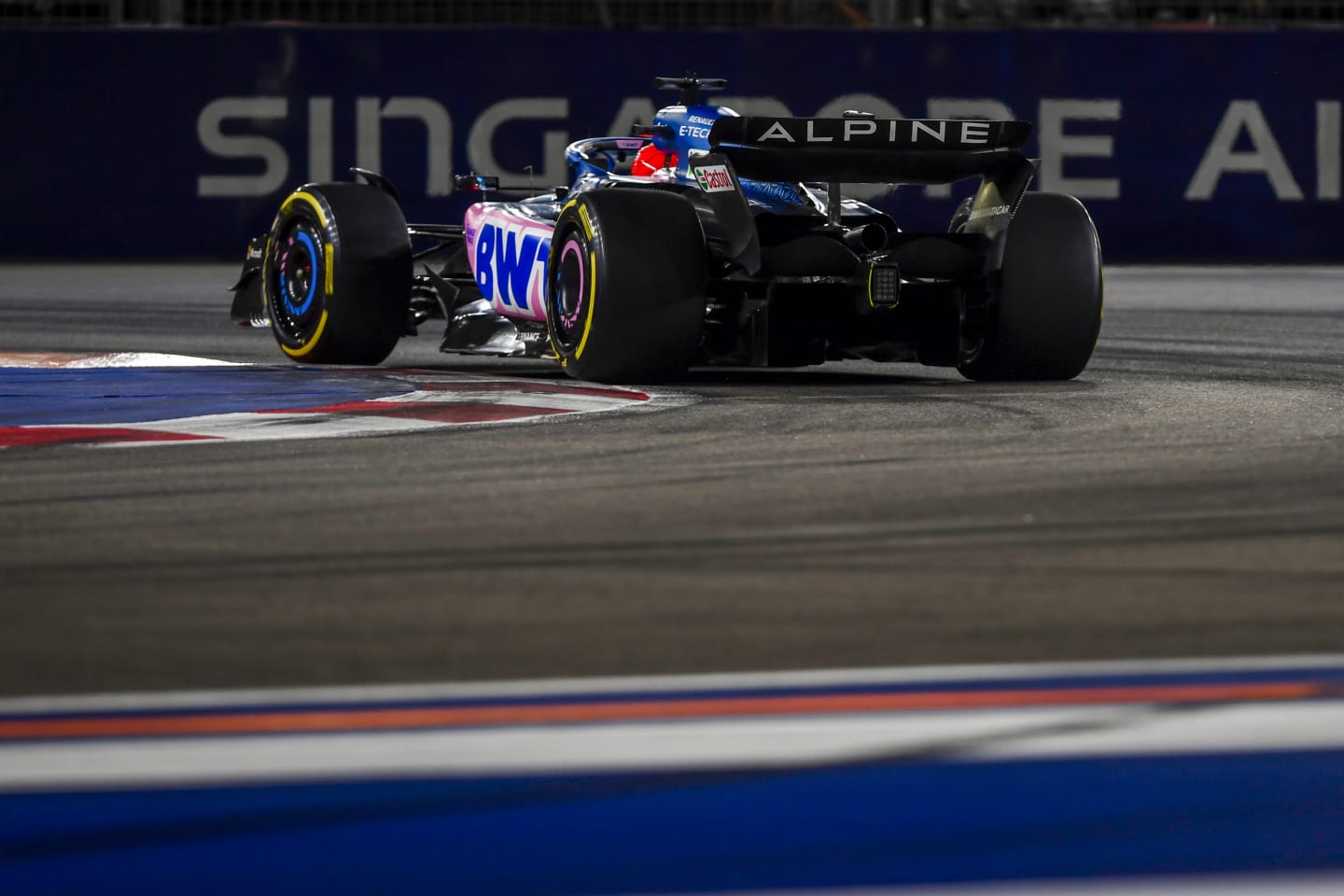 SINGAPORE, SINGAPORE - SEPTEMBER 17: Esteban Ocon of France driving the (31) Alpine F1 A523 Renault