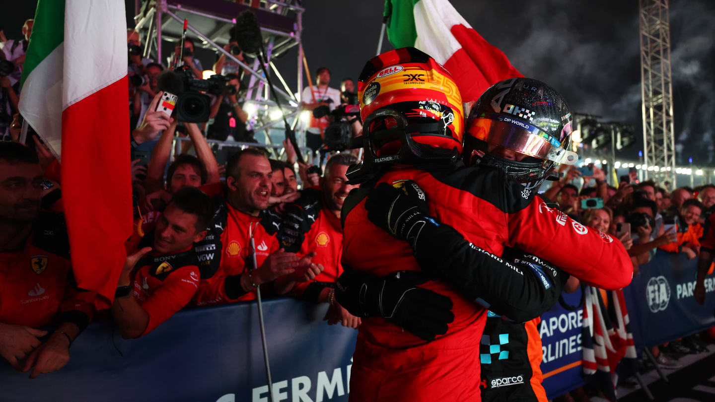 SINGAPORE, SINGAPORE - SEPTEMBER 17: Race winner Carlos Sainz of Spain and Ferrari and Second