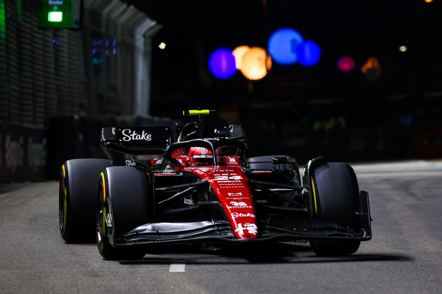 SINGAPORE, SINGAPORE - SEPTEMBER 17: Zhou Guanyu of China driving the (24) Alfa Romeo F1 C43 Ferrari on track during the F1 Grand Prix of Singapore at Marina Bay Street Circuit on September 17, 2023 in Singapore, Singapore. (Photo by Mark Thompson/Getty Images)
