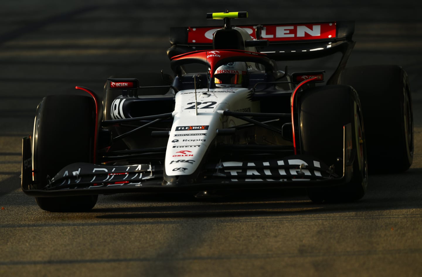 SINGAPORE, SINGAPORE - SEPTEMBER 15: Yuki Tsunoda of Japan driving the (22) Scuderia AlphaTauri