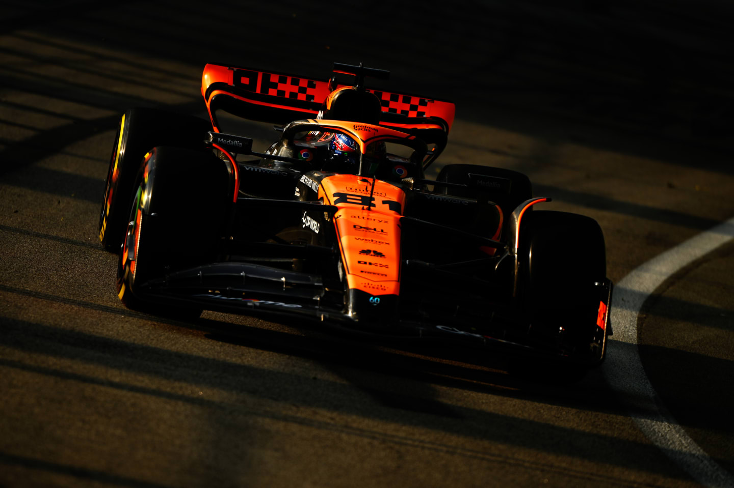 SINGAPORE, SINGAPORE - SEPTEMBER 15: Oscar Piastri of Australia driving the (81) McLaren MCL60 Mercedes on track during practice ahead of the F1 Grand Prix of Singapore at Marina Bay Street Circuit on September 15, 2023 in Singapore, Singapore. (Photo by Clive Mason/Getty Images)