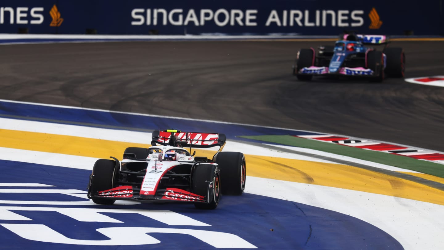 SINGAPORE, SINGAPORE - SEPTEMBER 15: Nico Hulkenberg of Germany driving the (27) Haas F1 VF-23 Ferrari runs wide during practice ahead of the F1 Grand Prix of Singapore at Marina Bay Street Circuit on September 15, 2023 in Singapore, Singapore. (Photo by Bryn Lennon - Formula 1/Formula 1 via Getty Images)