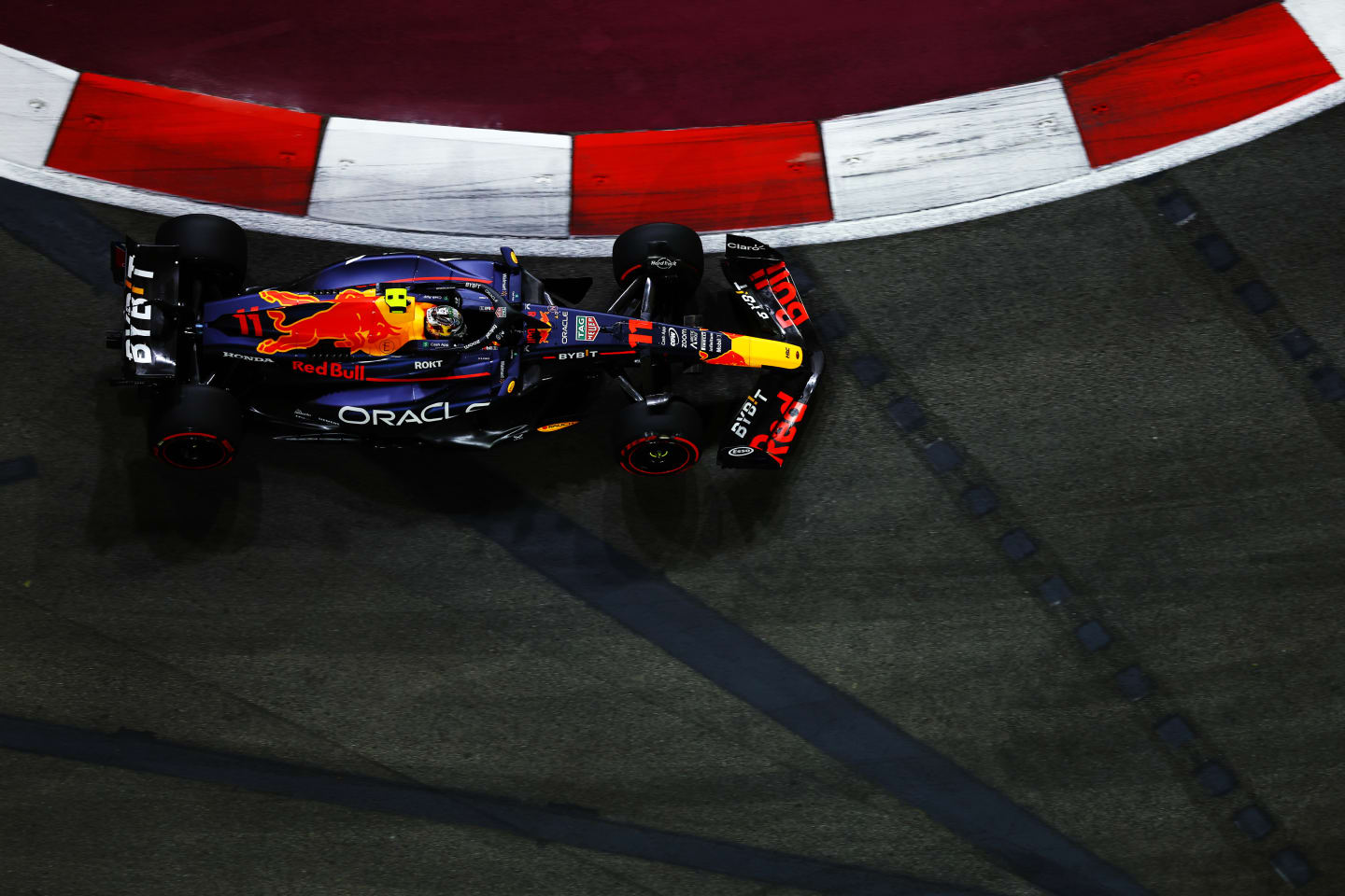 SINGAPORE, SINGAPORE - SEPTEMBER 15: Sergio Perez of Mexico driving the (11) Oracle Red Bull Racing RB19 on track during practice ahead of the F1 Grand Prix of Singapore at Marina Bay Street Circuit on September 15, 2023 in Singapore, Singapore. (Photo by Mark Thompson/Getty Images)