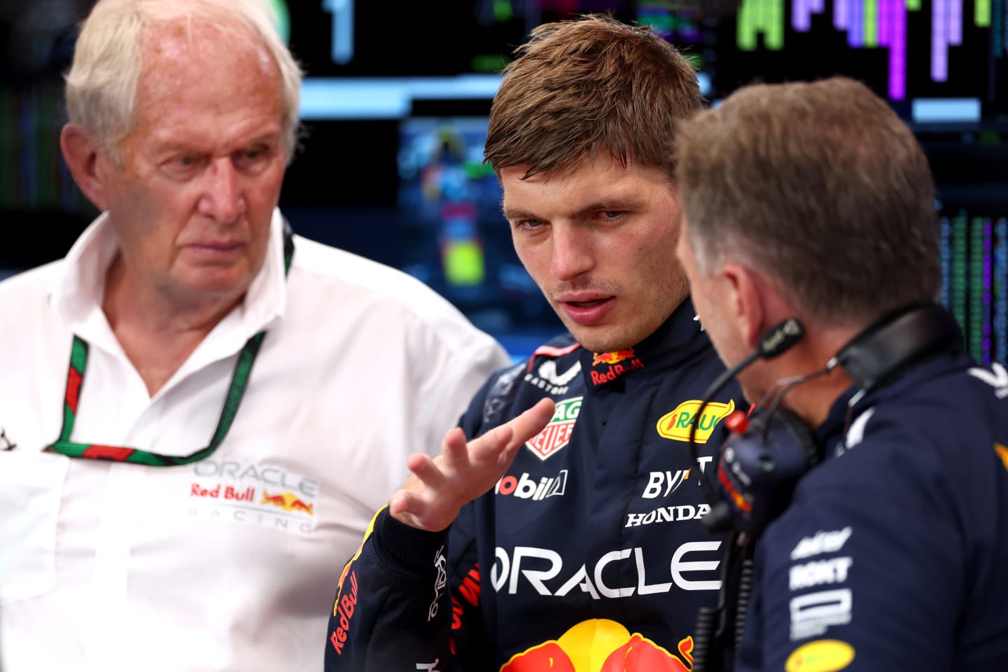 SINGAPORE, SINGAPORE - SEPTEMBER 15: Max Verstappen of the Netherlands and Oracle Red Bull Racing talks with Red Bull Racing Team Principal Christian Horner in the garage during practice ahead of the F1 Grand Prix of Singapore at Marina Bay Street Circuit on September 15, 2023 in Singapore, Singapore. (Photo by Dan Istitene - Formula 1/Formula 1 via Getty Images)