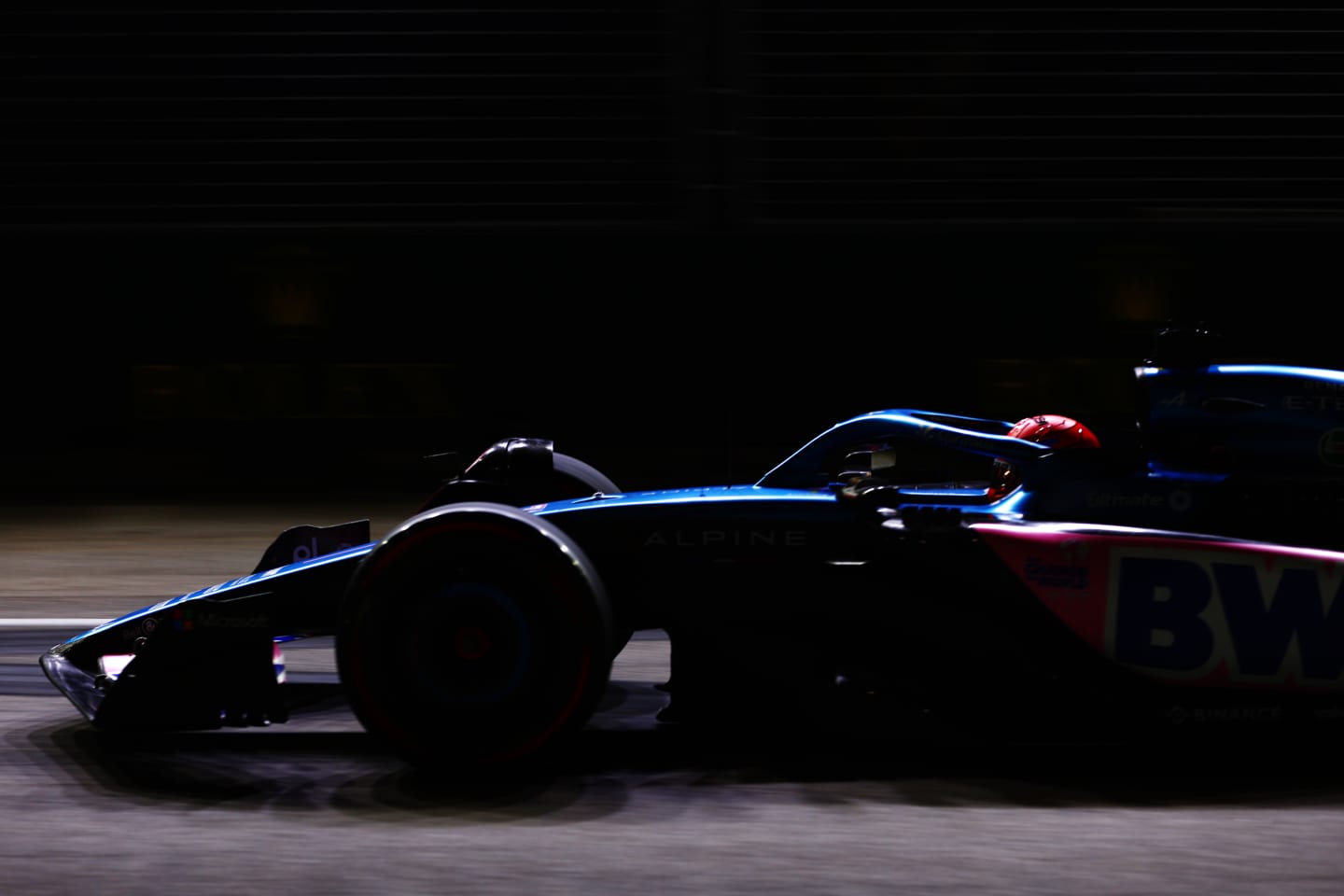 SINGAPORE, SINGAPORE - SEPTEMBER 15: Esteban Ocon of France driving the (31) Alpine F1 A523 Renault