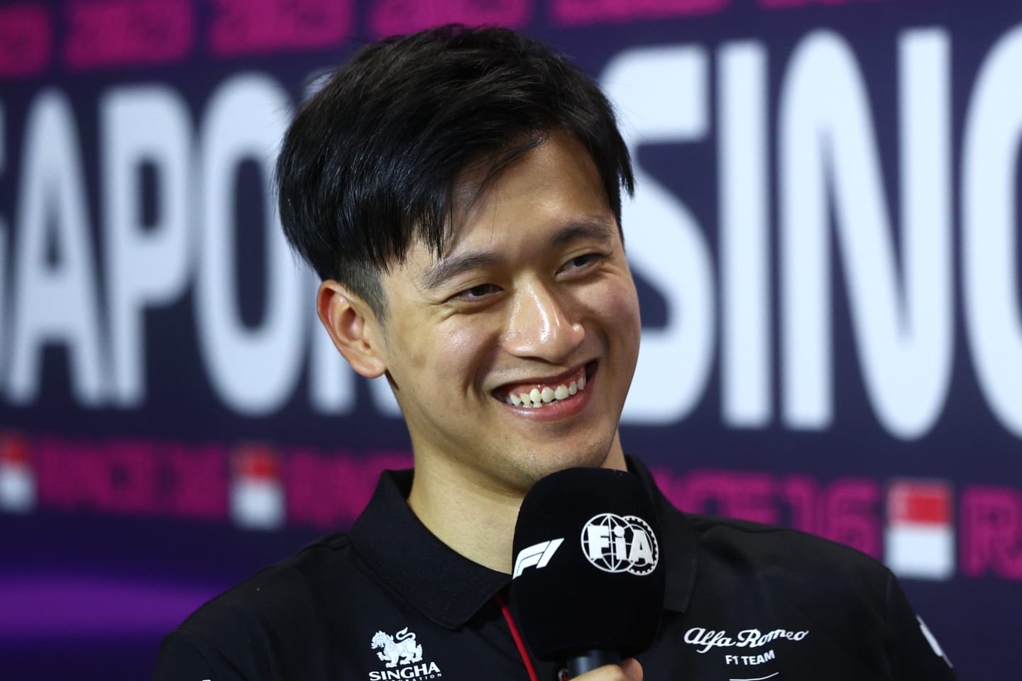 SINGAPORE, SINGAPORE - SEPTEMBER 14: Zhou Guanyu of China and Alfa Romeo F1 speaks during the press conference during previews ahead of the F1 Grand Prix of Singapore at Marina Bay Street Circuit on September 14, 2023 in Singapore, Singapore. (Photo by Clive Rose/Getty Images)