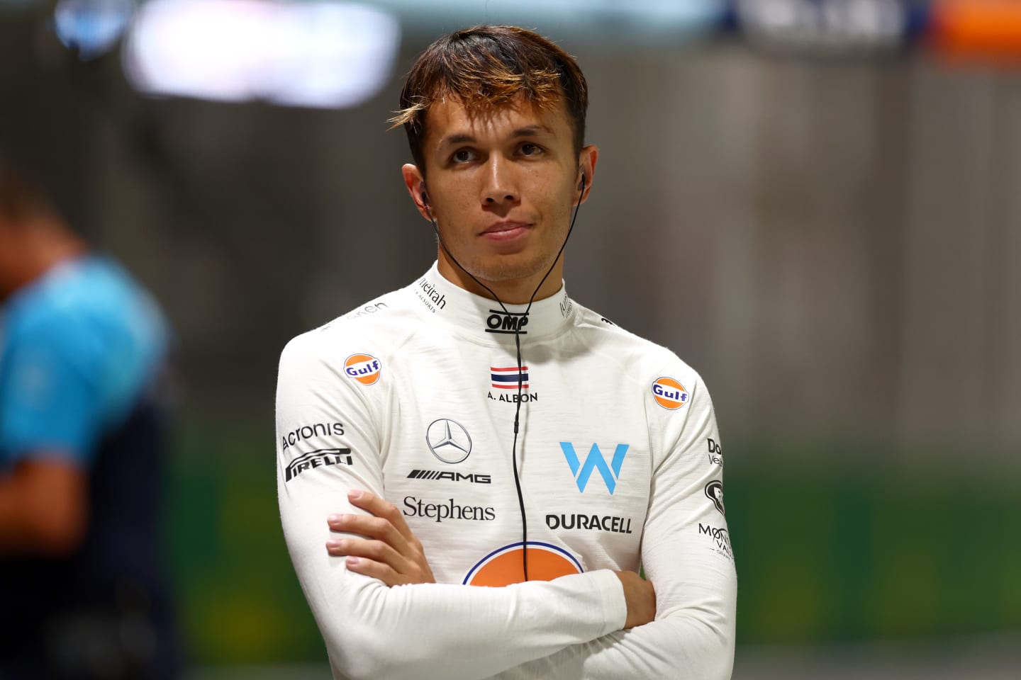 SINGAPORE, SINGAPORE - SEPTEMBER 16: Alexander Albon of Thailand and Williams looks on in the Pitlane during a red flag period during qualifying ahead of the F1 Grand Prix of Singapore at Marina Bay Street Circuit on September 16, 2023 in Singapore, Singapore. (Photo by Bryn Lennon - Formula 1/Formula 1 via Getty Images)