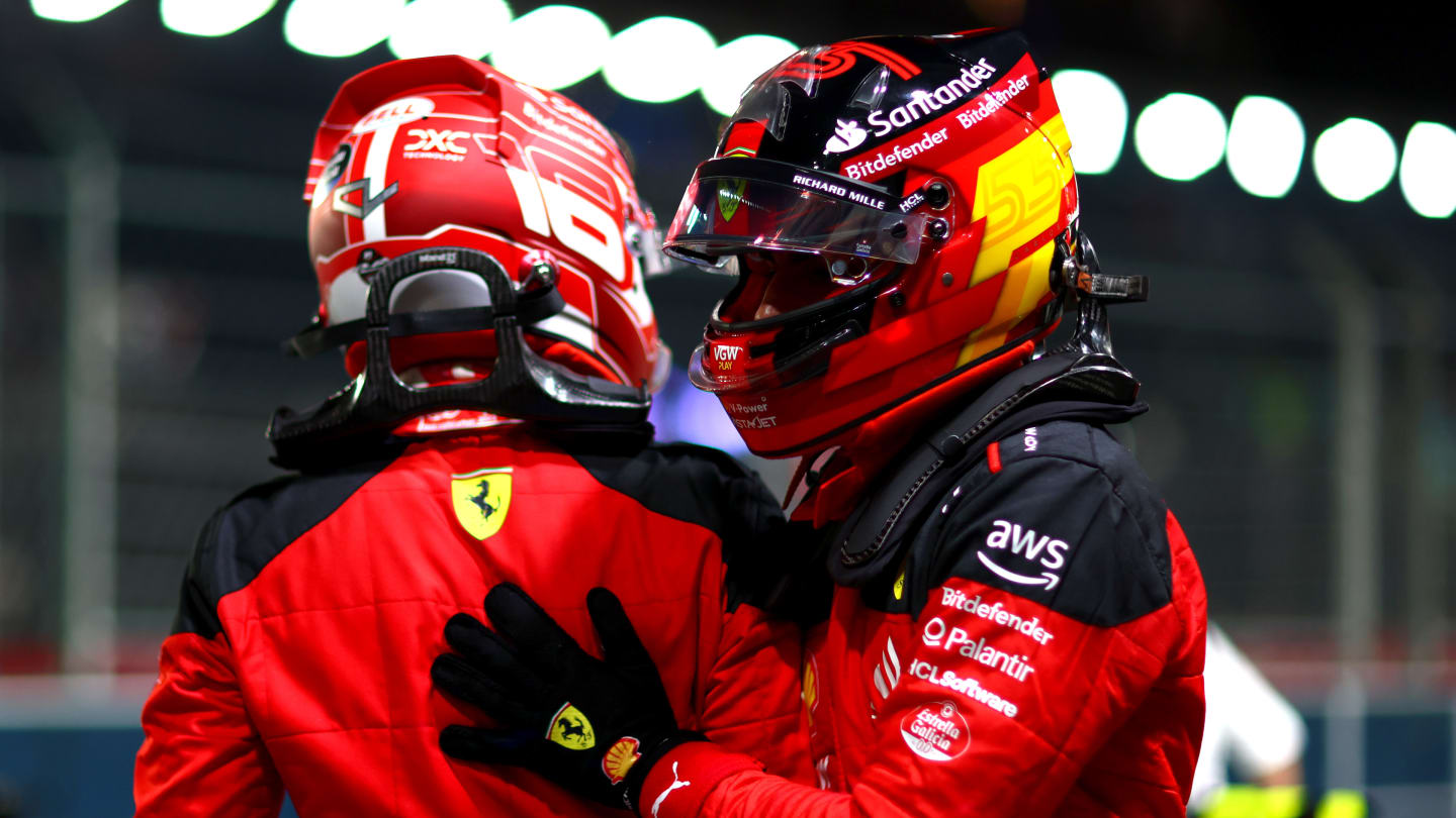 SINGAPORE, SINGAPORE - SEPTEMBER 16: Pole position qualifier Carlos Sainz of Spain and Ferrari