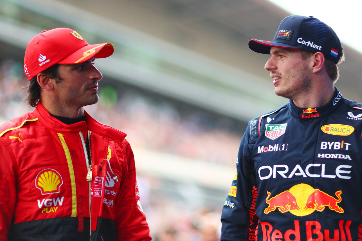 BARCELONA, SPAIN - JUNE 03: Pole position qualifier Max Verstappen of the Netherlands and Oracle Red Bull Racing and Second placed qualifier Carlos Sainz of Spain and Ferrari talk in parc ferme during qualifying ahead of the F1 Grand Prix of Spain at Circuit de Barcelona-Catalunya on June 03, 2023 in Barcelona, Spain. (Photo by Dan Istitene - Formula 1/Formula 1 via Getty Images)
