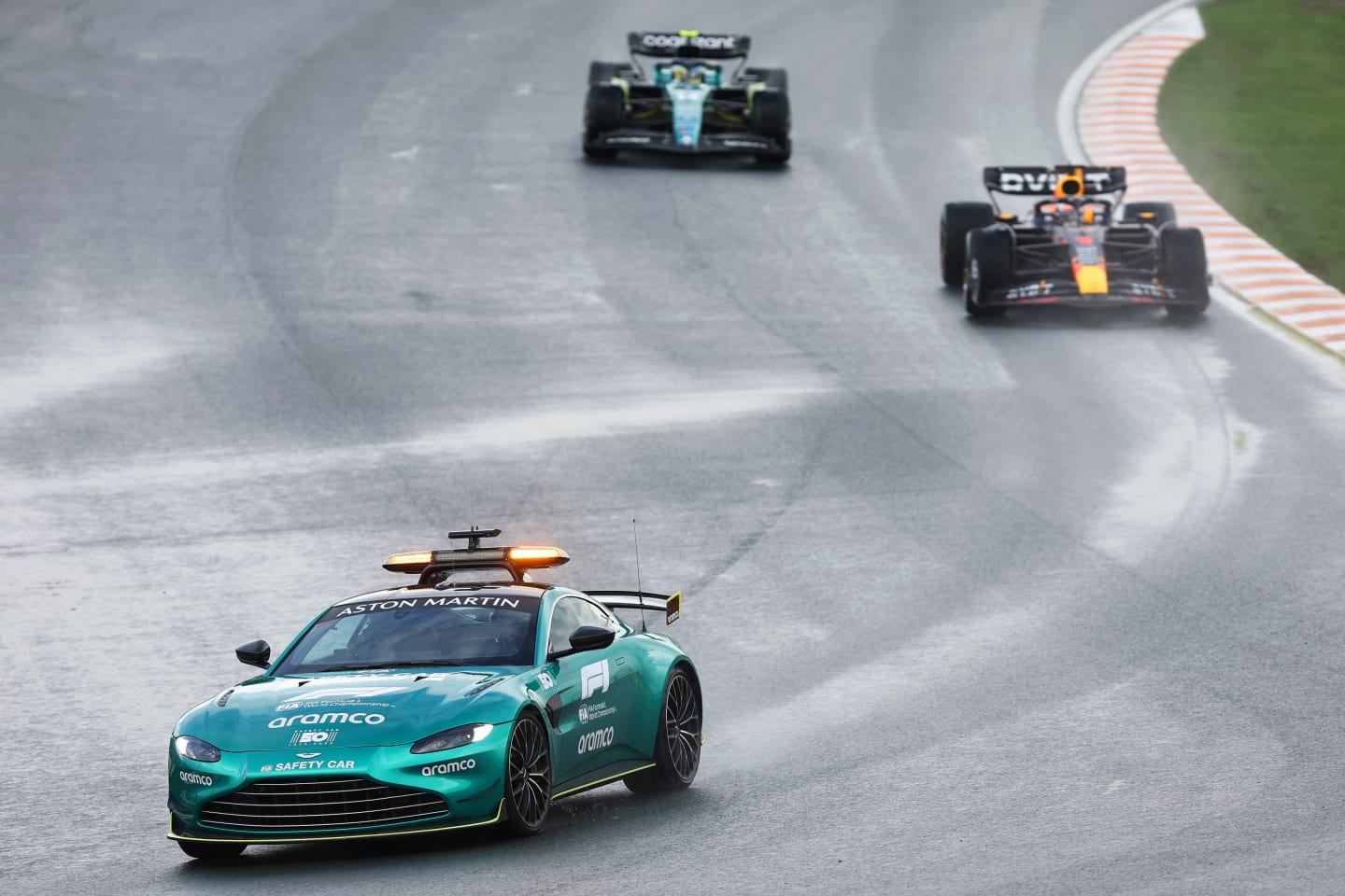ZANDVOORT, NETHERLANDS - AUGUST 27: The FIA Safety Car leads Max Verstappen of the Netherlands