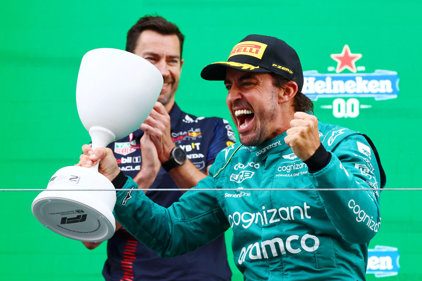 ZANDVOORT, NETHERLANDS - AUGUST 27: Second placed Fernando Alonso of Spain and Aston Martin F1 Team celebrates on the podium during the F1 Grand Prix of The Netherlands at Circuit Zandvoort on August 27, 2023 in Zandvoort, Netherlands. (Photo by Mark Thompson/Getty Images)