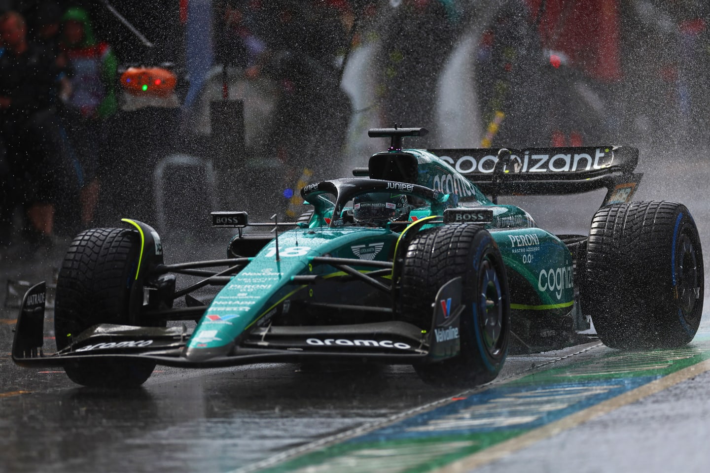 ZANDVOORT, NETHERLANDS - AUGUST 26: Lance Stroll of Canada driving the (18) Aston Martin AMR23 Mercedes in the rain in the Pitlane during final practice ahead of the F1 Grand Prix of The Netherlands at Circuit Zandvoort on August 26, 2023 in Zandvoort, Netherlands. (Photo by Dan Istitene - Formula 1/Formula 1 via Getty Images)