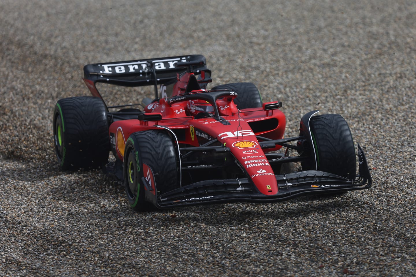ZANDVOORT, NETHERLANDS - AUGUST 26: Charles Leclerc of Monaco driving the (16) Ferrari SF-23 runs through the gravel during qualifying ahead of the F1 Grand Prix of The Netherlands at Circuit Zandvoort on August 26, 2023 in Zandvoort, Netherlands. (Photo by Lars Baron/Getty Images)
