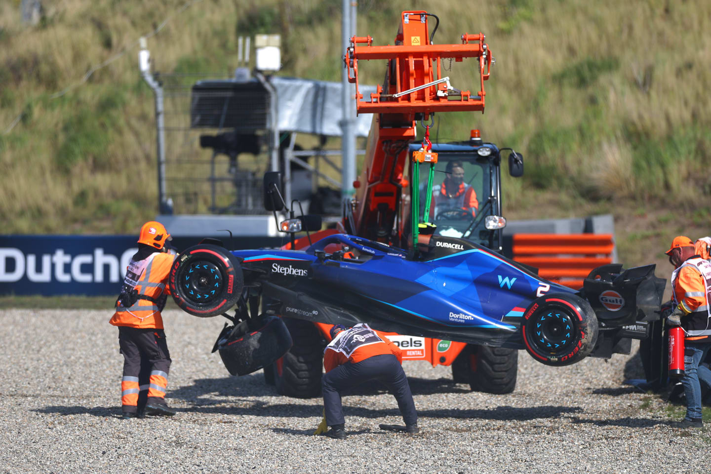 ZANDVOORT, NETHERLANDS - AUGUST 26: The car of Logan Sargeant of United States and Williams is removed from the track after he crashed during qualifying ahead of the F1 Grand Prix of The Netherlands at Circuit Zandvoort on August 26, 2023 in Zandvoort, Netherlands. (Photo by Peter Fox/Getty Images)