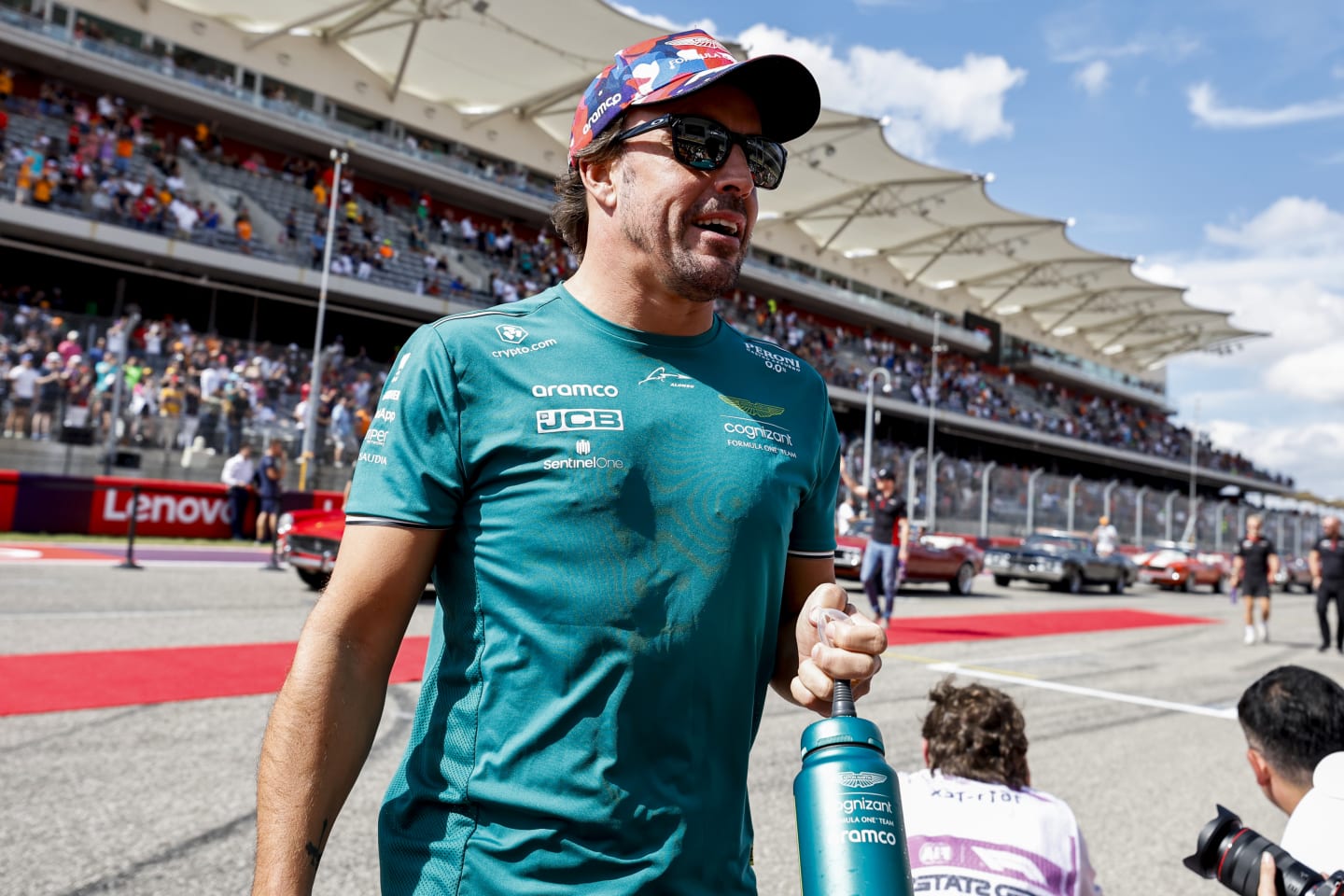 AUSTIN, TEXAS - OCTOBER 22: Fernando Alonso of Spain and Aston Martin F1 Team looks on from the drivers parade prior to the F1 Grand Prix of United States at Circuit of The Americas on October 22, 2023 in Austin, Texas. (Photo by Chris Graythen/Getty Images)