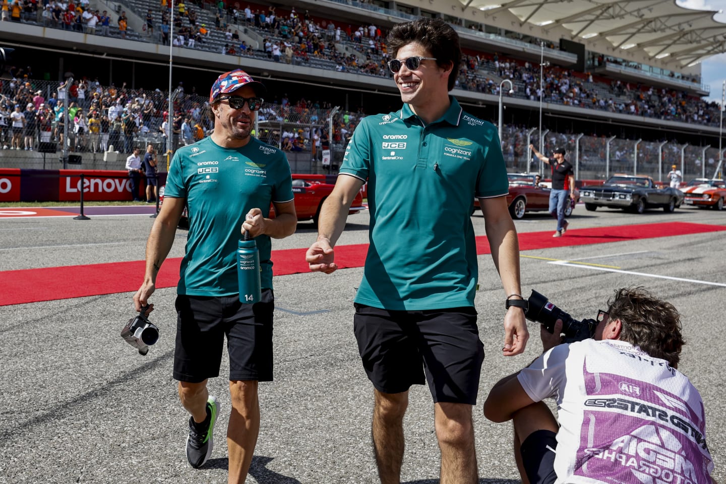 AUSTIN, TEXAS - OCTOBER 22: Fernando Alonso of Spain and Aston Martin F1 Team and Lance Stroll of