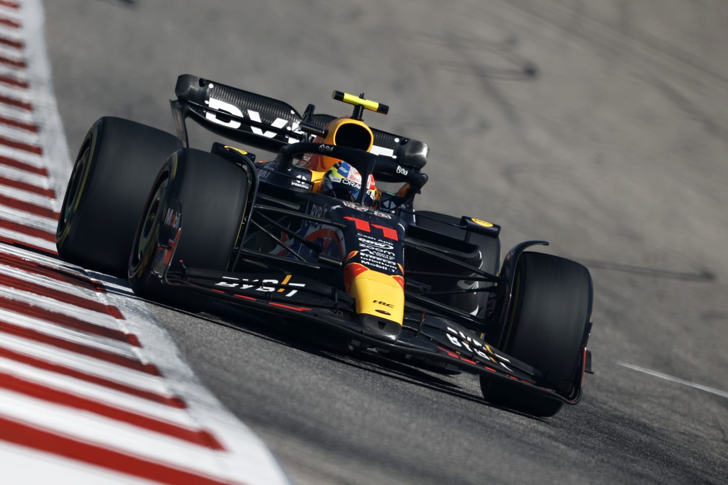 AUSTIN, TEXAS - OCTOBER 22: Sergio Perez of Mexico driving the (11) Oracle Red Bull Racing RB19 on track during the F1 Grand Prix of United States at Circuit of The Americas on October 22, 2023 in Austin, Texas. (Photo by Chris Graythen/Getty Images)