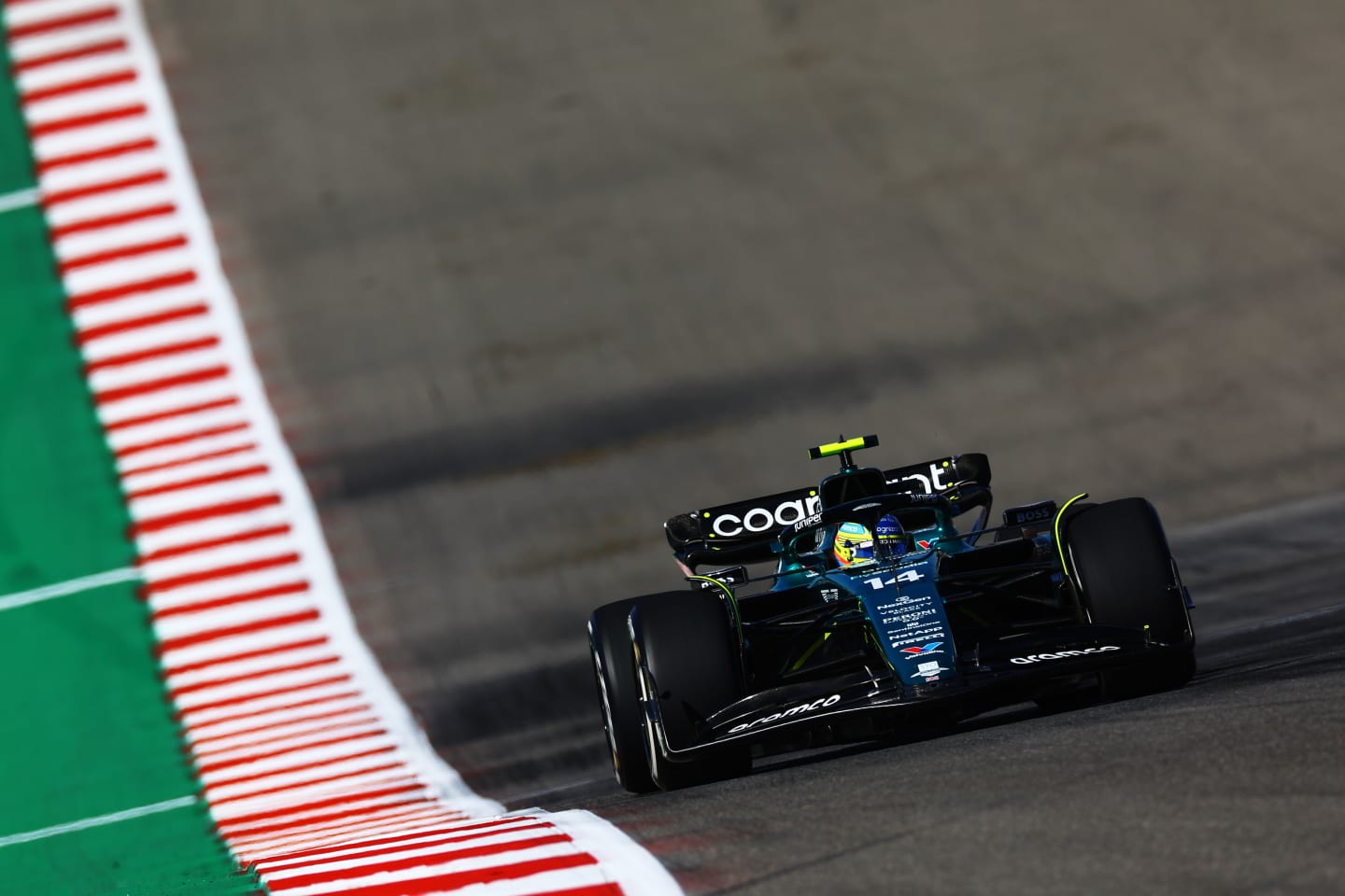 AUSTIN, TEXAS - OCTOBER 20: Fernando Alonso of Spain driving the (14) Aston Martin AMR23 Mercedes