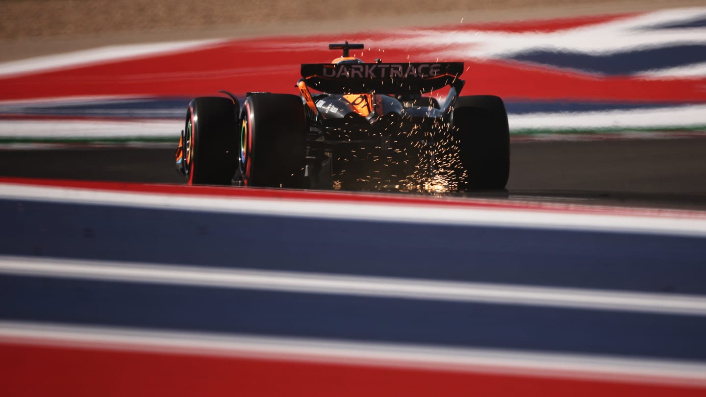 AUSTIN, TEXAS - OCTOBER 20: Sparks fly behind Oscar Piastri of Australia driving the (81) McLaren MCL60 Mercedes on track during qualifying ahead of the F1 Grand Prix of United States at Circuit of The Americas on October 20, 2023 in Austin, Texas. (Photo by Jared C. Tilton - Formula 1/Formula 1 via Getty Images)