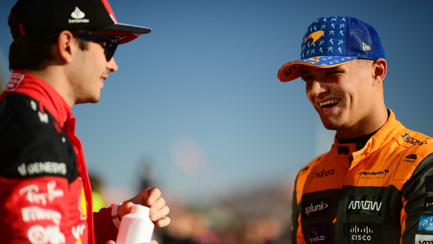 AUSTIN, TEXAS - OCTOBER 20: Pole position qualifier Charles Leclerc of Monaco and Ferrari talks with Second placed qualifier Lando Norris of Great Britain and McLaren in parc ferme after qualifying ahead of the F1 Grand Prix of United States at Circuit of The Americas on October 20, 2023 in Austin, Texas. (Photo by Mario Renzi - Formula 1/Formula 1 via Getty Images)