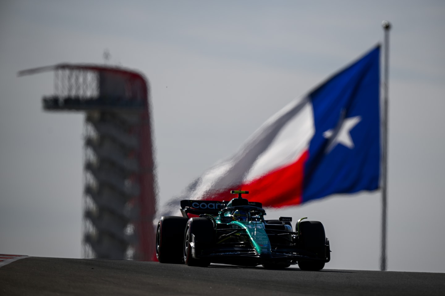 AUSTIN, TEXAS - OCTOBER 20: Fernando Alonso of Spain driving the (14) Aston Martin AMR23 Mercedes