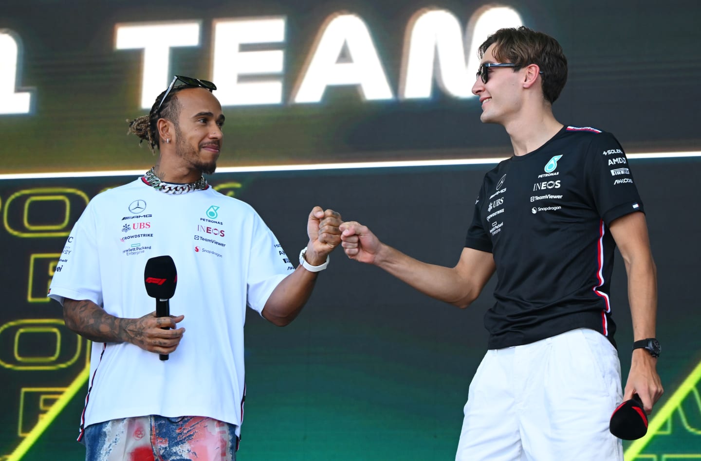AUSTIN, TEXAS - OCTOBER 21: Lewis Hamilton of Great Britain and Mercedes and George Russell of
