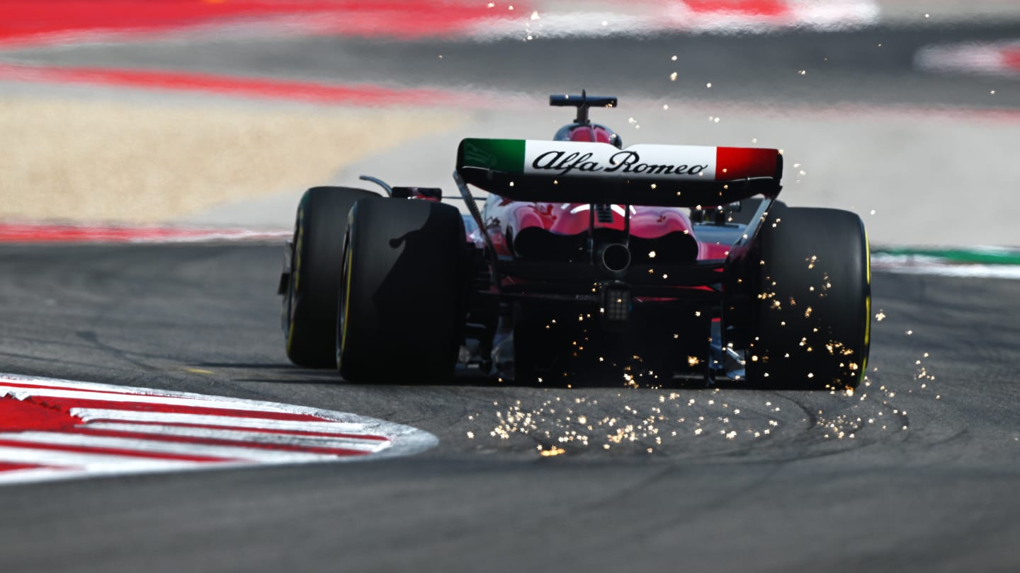 AUSTIN, TEXAS - OCTOBER 21: Sparks fly behind Valtteri Bottas of Finland driving the (77) Alfa Romeo F1 C43 Ferrari on track during the Sprint Shootout ahead of the F1 Grand Prix of United States at Circuit of The Americas on October 21, 2023 in Austin, Texas. (Photo by Clive Mason - Formula 1/Formula 1 via Getty Images)